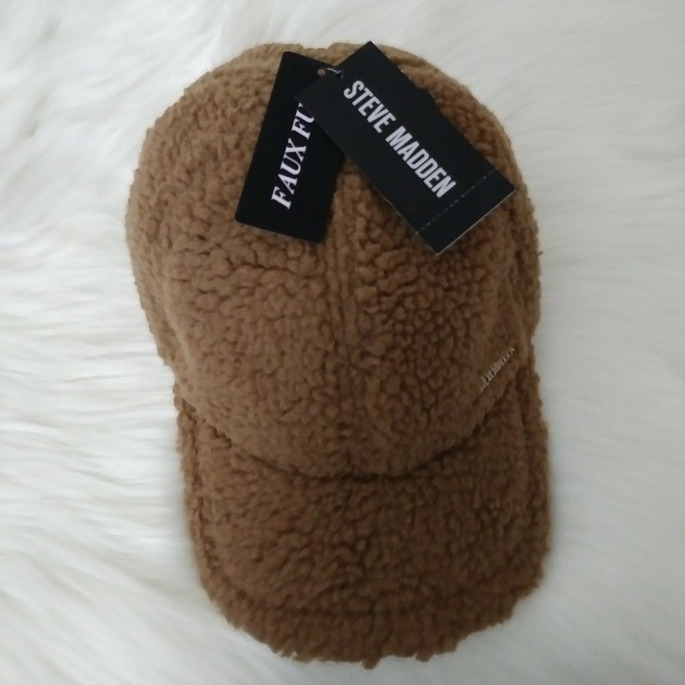 Steve Madden Faux Fur Tan Cap Silver Tone Logo